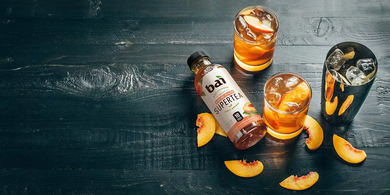 Peach Ginger Bourbon Iced Tea Recipe featuring Bai Nariño Peach Supertea