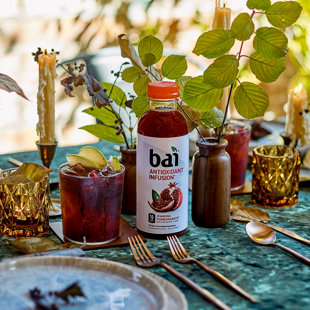 Bai Ipanema Pomegranate on a fall table