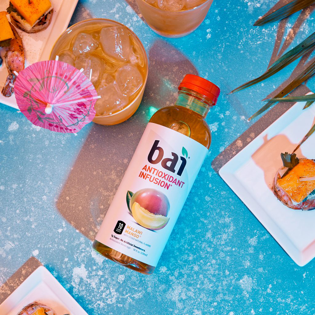 Bai Malawi Mango and a cocktail with an umbrella