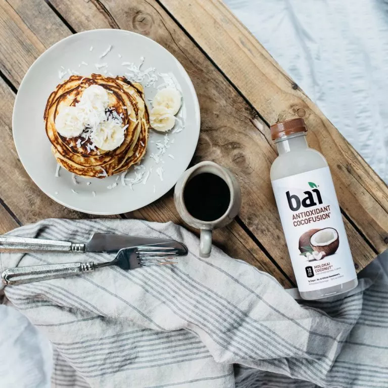 Keto Coconut Pancakes stacks with Bai Molokai Coconut