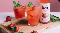 Strawberries in a drink made with Bai Sao Paulo Strawberry Lemonade