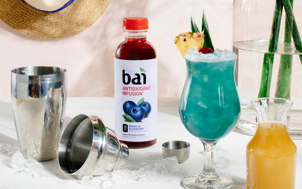 Bai Brasilia Blueberry with colorful cocktails for Spring Break