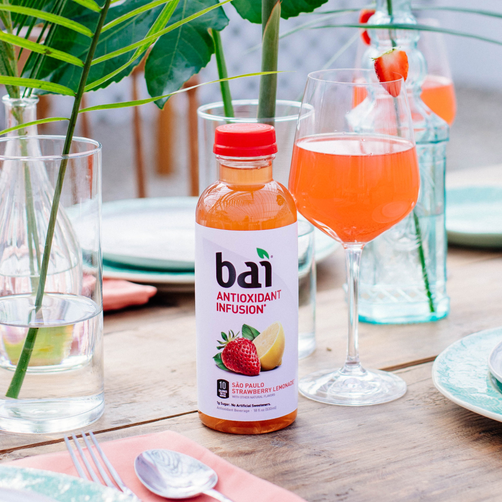 Bai Sao Paulo Strawberry Lemonade on a table with summer cocktails